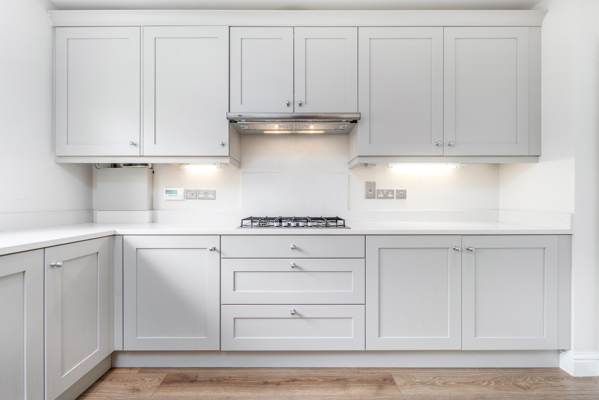 White cabinets in a kitchen in El Paso.